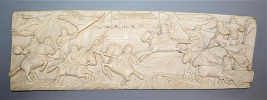 A Chinese ivory plaque, early 20th century 32 x 11cm